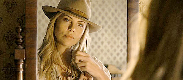 Charlize Theron as Anna, a young woman trying to live down a mistake in her past in A Million Ways to Die in the West (2014)