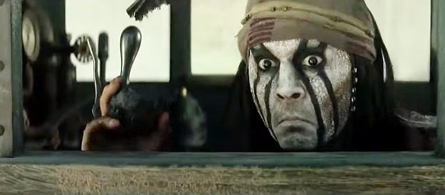 Johnny Depp as Tonto, shocked by what he's witnessing from the train in The Lone Ranger (2013)