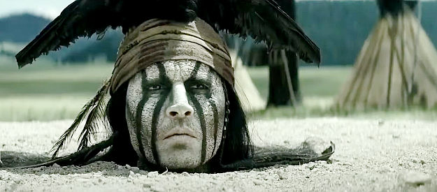 Johnny Depp as Tonto, up to his neck in trouble in The Lone Ranger (2013)
