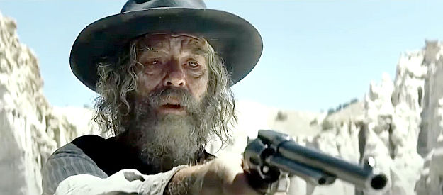 Leon Rippy as Collins, the scout who leads a Texas Ranger patrol into an ambush in The Lone Ranger (2013)