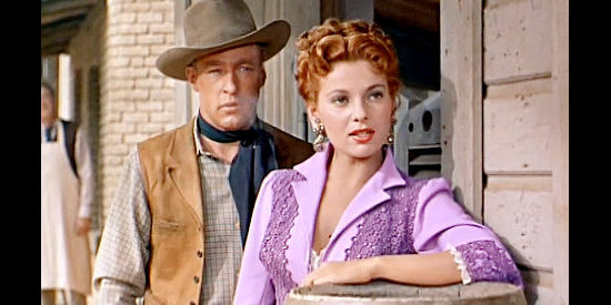 Abbe Lane as Kate with beau Jed Ringer (Russell Johnson), wishing the worst for Whitey Kincaid in Ride Clear of Diablo (1954)