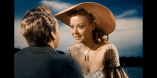 Adele Mara as Constance Strong, agreeing to help Loomis achieve his dream of building a railroad bridge across the Mississippi River in Rock Island Trail (1950)