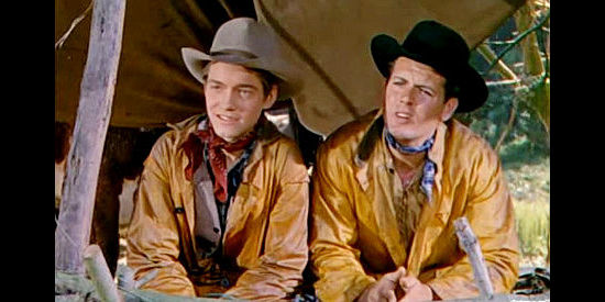 Al Caudebec as Mel Young and Roydon Clark as his brother Jim, young men who become Ballard ranch hands in Ride the Man Down (1952)