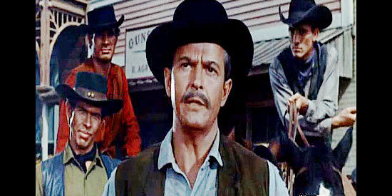 Alan Baxter as Reed Williams, the cattle king furious with Sheriff Mark Riley for cutting his fences in Face of a Fugitive (1959)