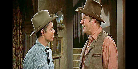 Alan Hale Jr. as Jack Larson (right) arguing with Tom Destry over the fee he's being asked to pay to drive cattle across Decker's newly acquired land in Destry (1954)