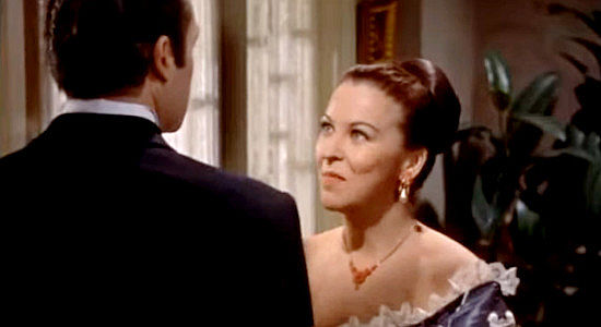 Andrea King as Miss Idell, the finishing school owner who benefits from Amantha's misfortune in Band of Angels (1957)