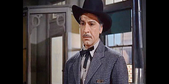 Anthony Caruso as Mayor Turlock, the man who handpicks stranger Tom Brewster as Bluerock's new sheriff and soon learns he's made a mistake in The Boy from Oklahoma (1954)