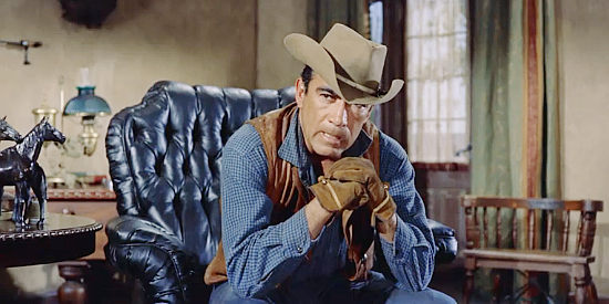 Anthony Quinn as cattle king Craig Belden, fretting over his son Rick in Last Train from Gun Hill (1959)