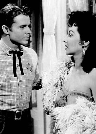 Audie Murphy as Tom Destry and Mari Blanchard as Brandy in Destry (1953)