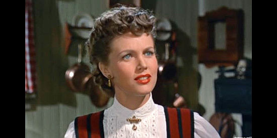 Barbara Britton as Lottie Priest, fed up with her fiancee risking his life to save another woman's ranch in Ride the Man Down (1952)