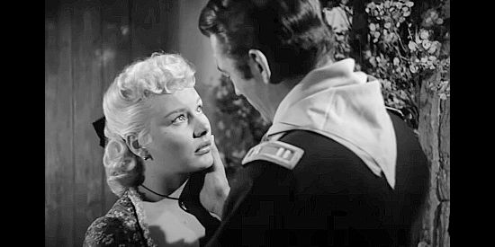Barbara Payton as Cathy Eversham with Capt. Richard Lance, the man she loves, in Only the Valiant (1951)