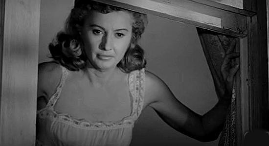 Barbara Stanwyck as Rela, summoned from below by Wes Anderson in The Moonlighter (1953)