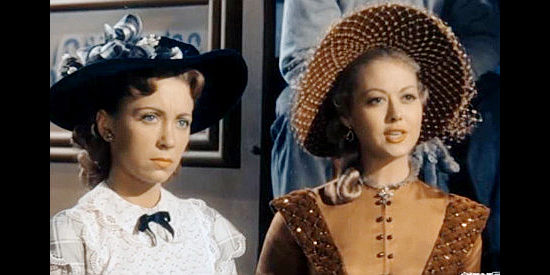 Barbra Fuller as Annabelle Marsh and Adele Mara as Constance Strong, lured into an argument by Loomis in Rock Island Trail (1950)