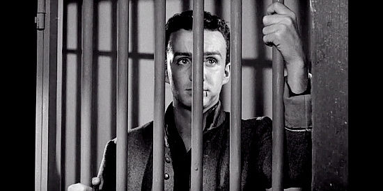 Ben Cooper as Gray Mason, in jail after the death of Petey Willoughby in Rebel in Town (1956)