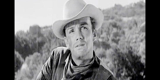 Ben Cooper as Johnny Shattuck, the young man who returns home after a long absense in Duel at Apache Wells (1957)