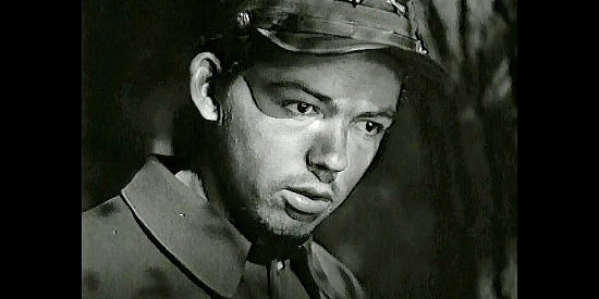 Bill Mauldin as Tom Wilson, the brash young soldier and one of Henry Fleming's friends in The Red Badge of Courage (1951)