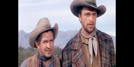 Bob Steele as Charlie Morgan and Henry Brandon as Jim Currie, hands on the drive in Cattle Drive (1951)