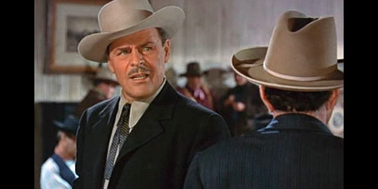 Brian Donlevy as Bide Marriner, determined to graze cattle on the Hatchett range in Ride the Man Down (1952)