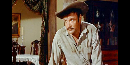 Brian Keith as Cole Wilkison, helping enforce his older brother's will on the Anchor Ranch in The Violent Men (1955)