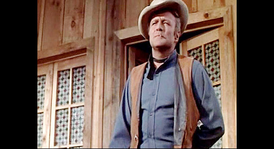 Brian Keith as Jack McCracken, a hired gun who decides to side with Miguel Delmonte and his pretty sister in Sierra Baron (1958)