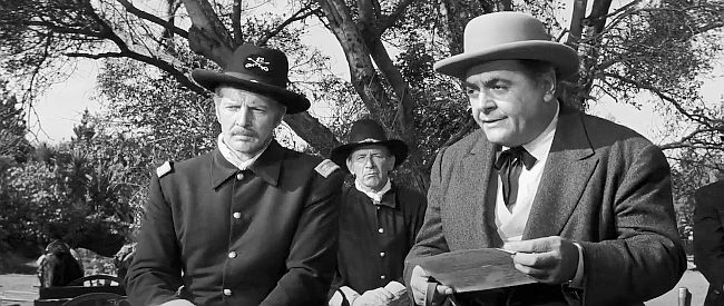 Bruce Bennett as Maj. Kincaid and Robert Middleton as Mr. Siringo, looking for the men who stole an army payroll in Love Me Tender (1956)