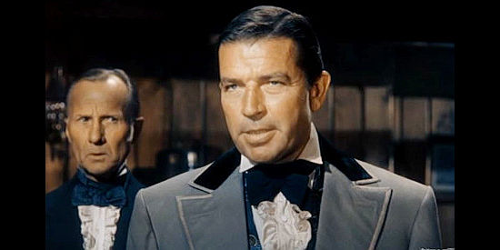 Bruce Cabot as Kirby Morrow, the riverboat tycoon who loses his girl to Loomis in Rock Island Trail (1950)