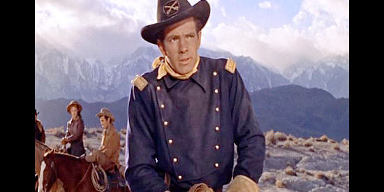 Burt Douglas as the cavalry lieutenant who warns Hollister and his companions of Indian trouble in The Law and Jake Wade (1958)
