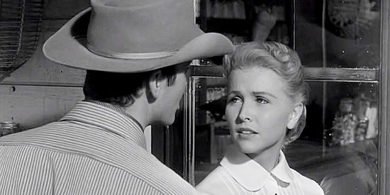 Cecile Rogers as Amy Wentworth, one of the girls Jeff Blaine (Ben Cooper) romanes in The Outlaw's Son (1957)
