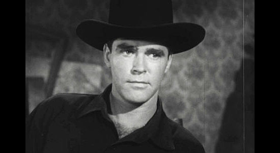 Charles Quinlivan as John Trey, a former circus trick-shot artist now reluctant to use a gun in Seven Guns to Mesa (1958)