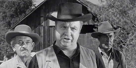 Charles Watts as Marshal Blessingham, about to take Nate Blaine into custody in The Outlaw's Son (1957)