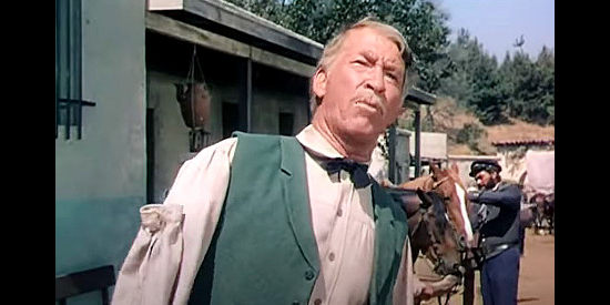 Chill Wills as John Gage, one of the men who brand John Stroud a coward in The Man from the Alamo (1953)