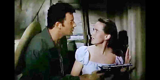 Cornel Wilde as Don Arturo Bordega, trying to prevent Julia Lawrence (Teresa Wright) from putting a bullet into Jose Martinez in California Conquest (1952)