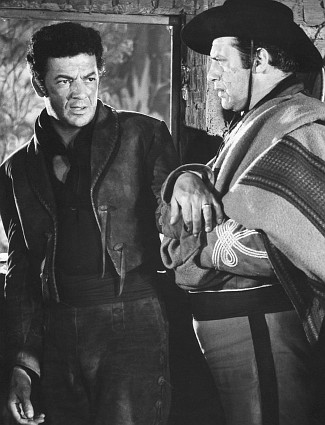 Cornell Wilde as Juan Obregon and Raymond Burr as Capt. Rodriguez in Passion (1954)