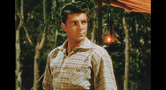 Dale Robertson as Will Gray, jealous over the attention Jane Winters is paying to Jim Redfern in The Cariboo Trail (1950)