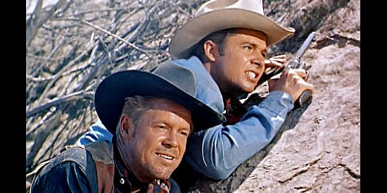 Dan Duryea as Whitey Kincaid and Audie Murphy as Clay O'Mara, pinned down on the ride back to town in Ride Clear of Diablo (1954)