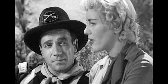 Dane Clark as Capt. Dave Storm and Dorothy Patrick as Murdock during a reflective moment in Thunder Pass (1954)