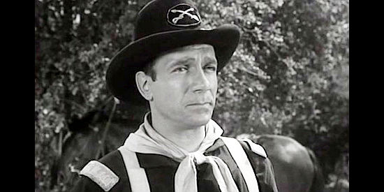 Dane Clark as Capt. Dave Storm, on a desperate journey to lead his patrol to safety in Thunder Pass (1954)