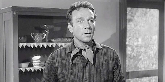 Dane Clark as Nate Blaine, returning home for a reunion with his young son in The Outlaw's Son (1957)