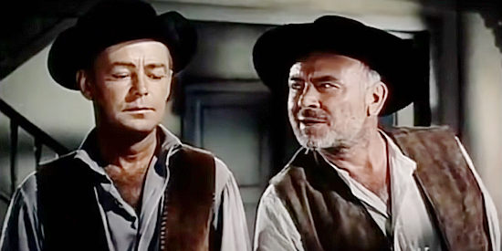 Dean Jagger as Harry Burleigh, trying to convince John Chandler (Alan Ladd) to help him get Linnett's land in The Proud Rebel (1958)