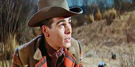 Dean Stockwell as Hade Keough, the youngest brother, reckless and fearless in Gun for a Coward (1956)