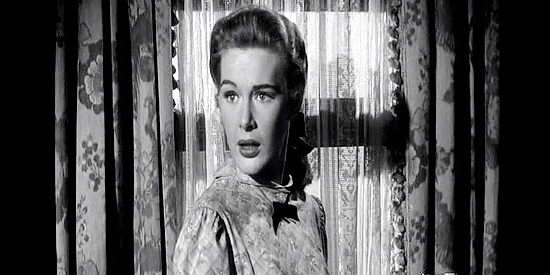 Diane Brewster as Helen Danner, Clay's former flame, who shows up in Santa Rita married to one of his old friends in Black Patch (1957)