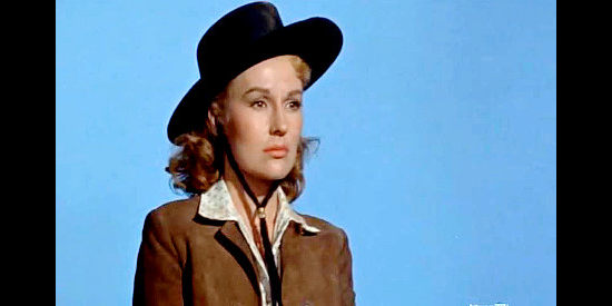 Dianne Foster as Judith Wilkison, returning to her family's Anchor ranch and an unhappy sight in The Violent Men (1955)