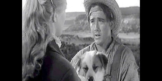Dickie Jones as Jimmy 'Buck' Wheat, asking Johanna Carter to look after his dog Spot in Rocky Mountain (1960)