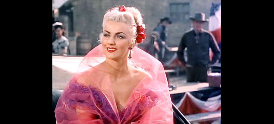Dolores Moran as Dolly, the saloon girl and former flame who helps Ballard in SIlver Lode (1954)