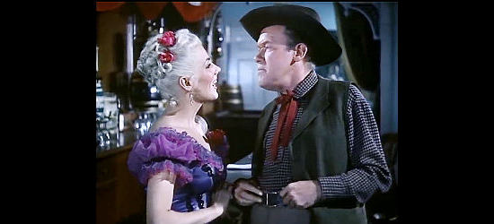 Dolores Moran as saloon girl Dolly with telegraph operator Paul Herbert (Frank Sully) in SIlver Lode (1954)