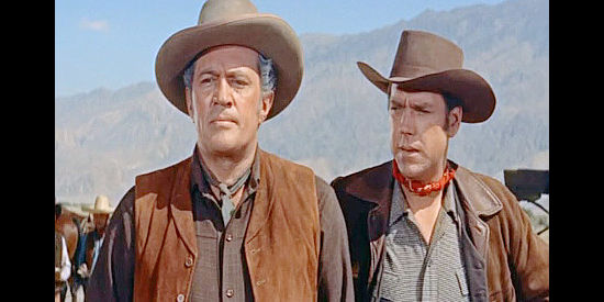 Don Haggerty as Ralph Hamilton and Bing Russell as his brother Douglas, pinning their hopes on John Cord's trustworthiness in Cattle Empire (1958)