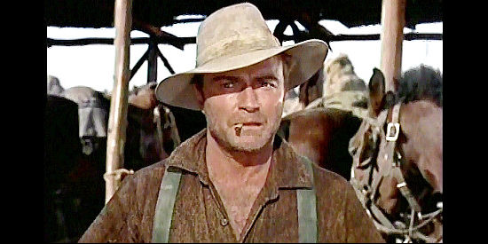 Donald Barry as Clete, watching a group of possibly hostile Indians approach in Seven Men from Now (1956)