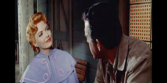 Dorothy Green as Ellen Bailey, a widow getting to know Ray Kincaid (Fred MacMurray) better, but not knowing his secret in Face of a Fugitive (1959)