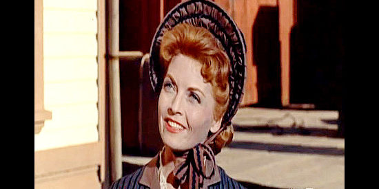 Dorothy Green as Ellen Bailey, sister of a sheriff who's gotten in over his head in Face of a Fugitive (1959)