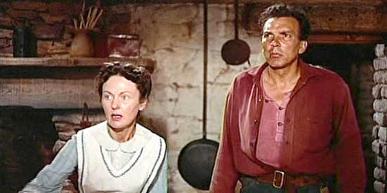 Dorothy Jordan as Martha Edwards and Walter Coy as Aaron Edwards, the family Ethan returns to after the war in The Searchers (1956)
